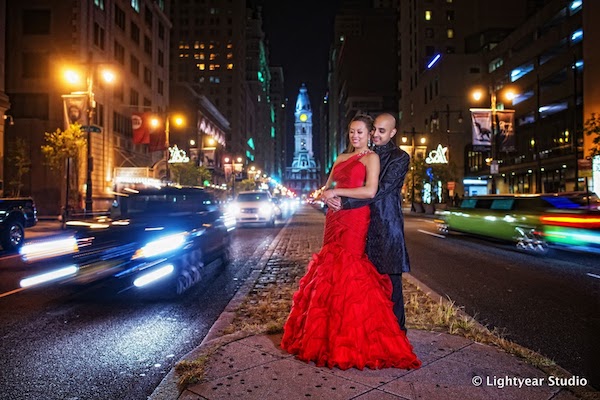 Just Married - Philadelphia weddings - Philadelphia multicultural weddings - Philadelphia fusion weddings- bride in a red dress - bride and groom on Broad Street