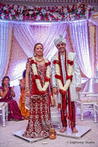 Indian fusion wedding - Indian Vietnamese wedding - Philadelphia multicultural weddings - bride and groom in traditional Indian wedding attire - traditional Indian wedding attire