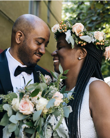 bride with floral crown and matching bridal bouquet in soft pinks with dusty miller and seeded eucalyptus