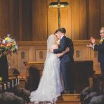 Elegant Events Florist - Philadelphia wedding florist - fall bridal bouquet - orange calla lily - yellow roses - mango calla lily - villanova conference center - villano pa - bg productions photography and videography - indoor ceremony